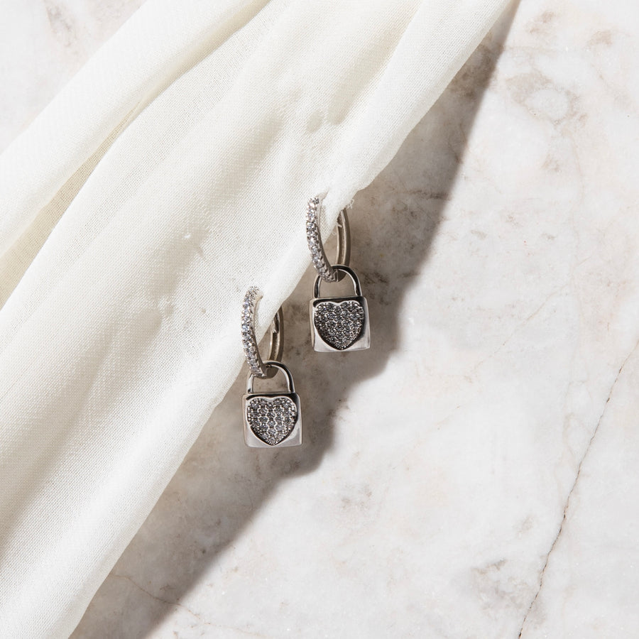 Cubic Zirconia huggie with padlock pendant