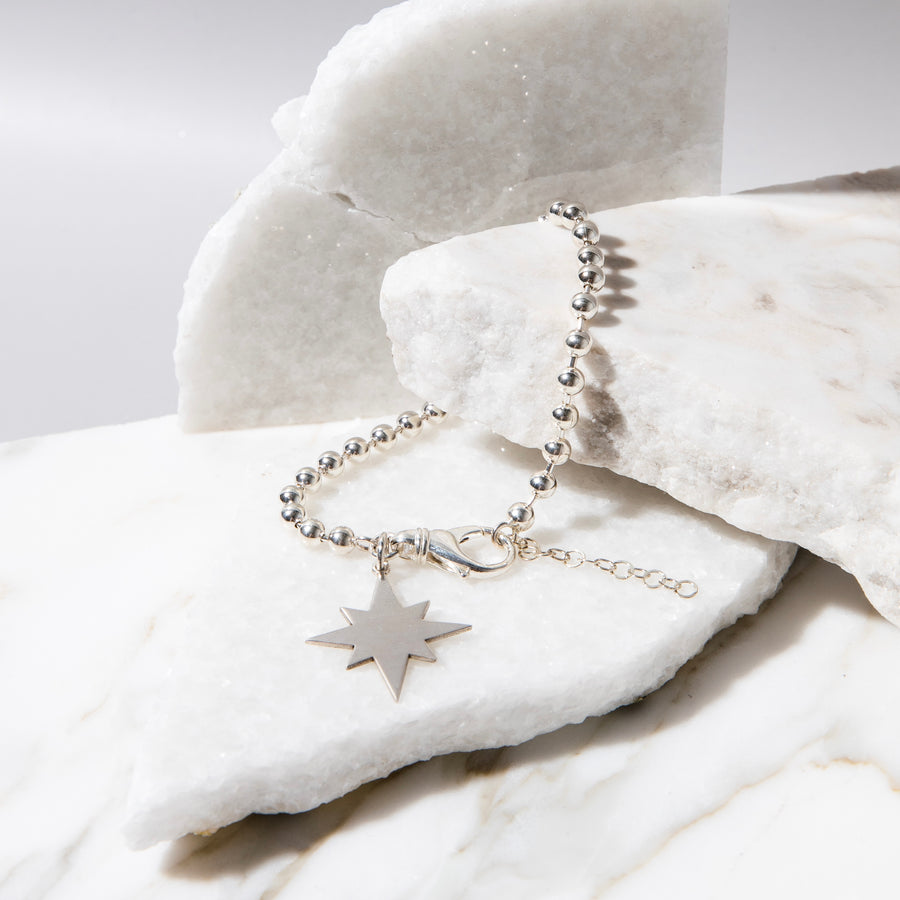 Sterling silver bracelet with star pendant